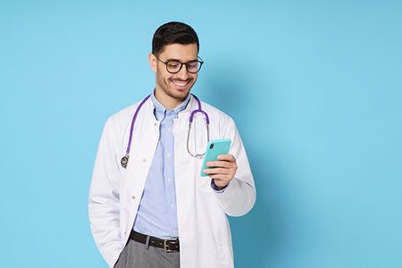 Horizontal,Banner,Of,Young,Male,Doctor,In,White,Coat,Smiling,