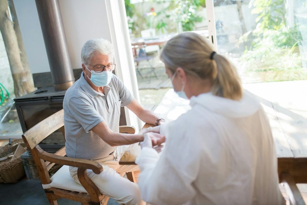 Doctor checking Patient’s Wrist